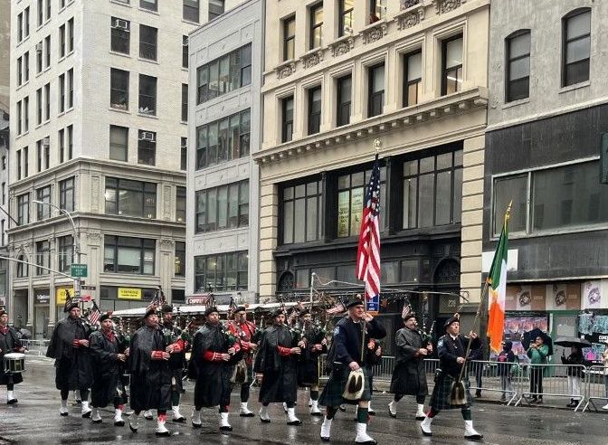 Veterans March Under Rainy Skies 