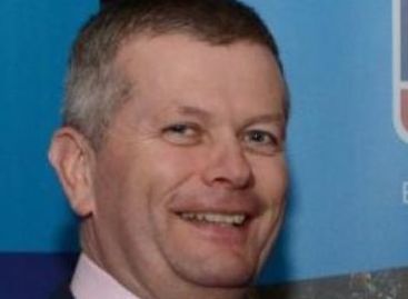 Immigration Leader Minihane Honored