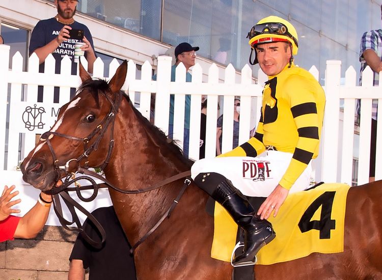 Cool, old Drafted rallies to win 