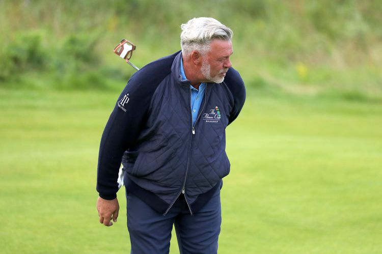 Clarke holds off Harrington