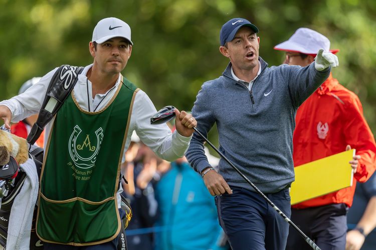 'Mentally drained' McIlroy prevails in Dubai Desert Classic