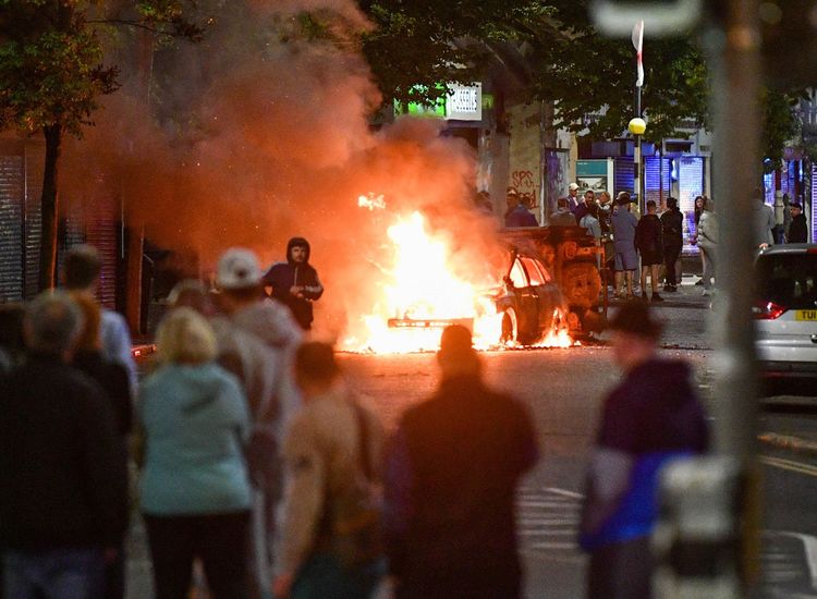 GERRY ADAMS: Let's send a strong message to the racists