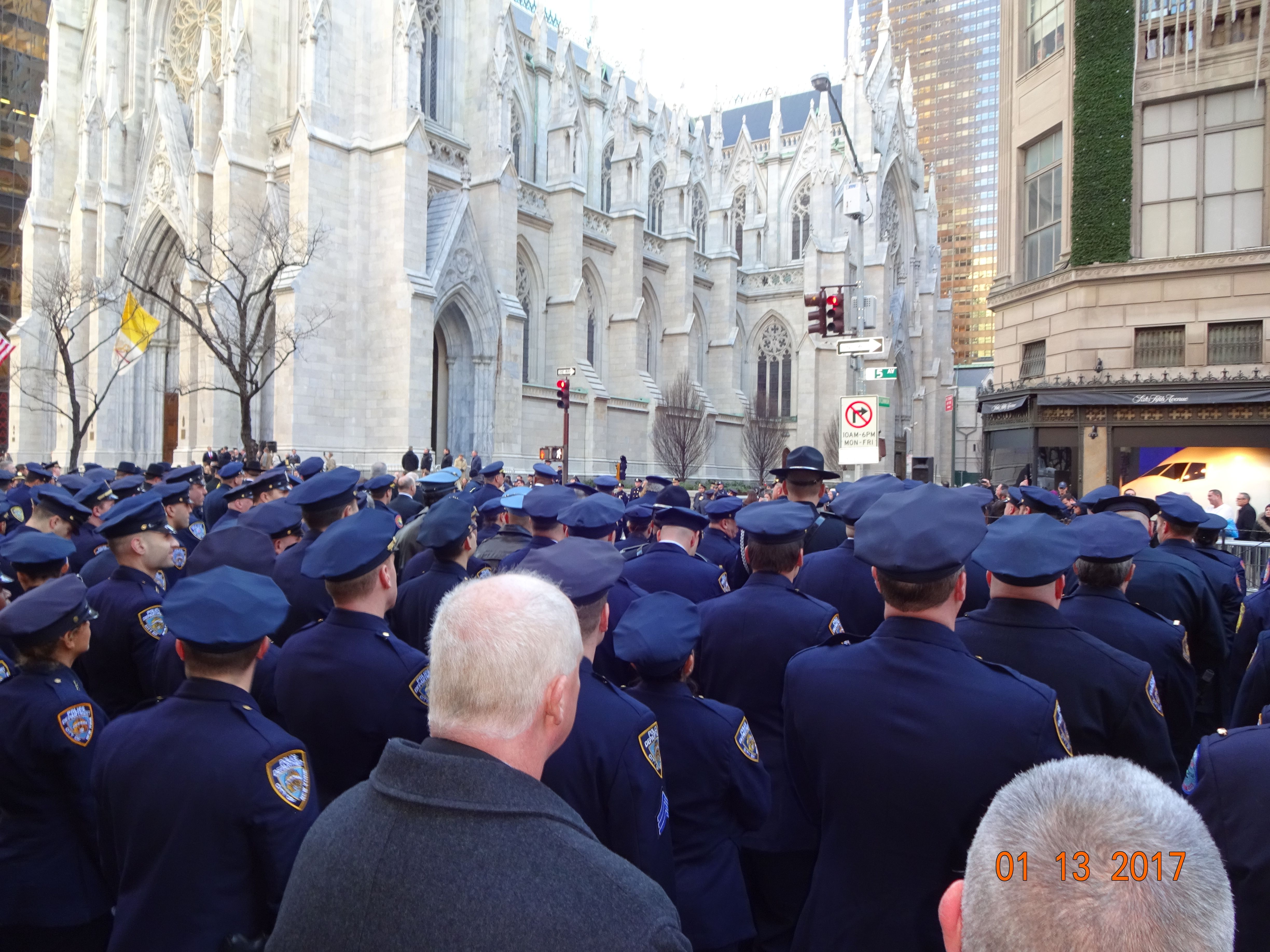 A "Sea of Blue" outside St. Patrick's Cathedral during Steven McDonald's funeral. Photo by Madeline O'Boyle.