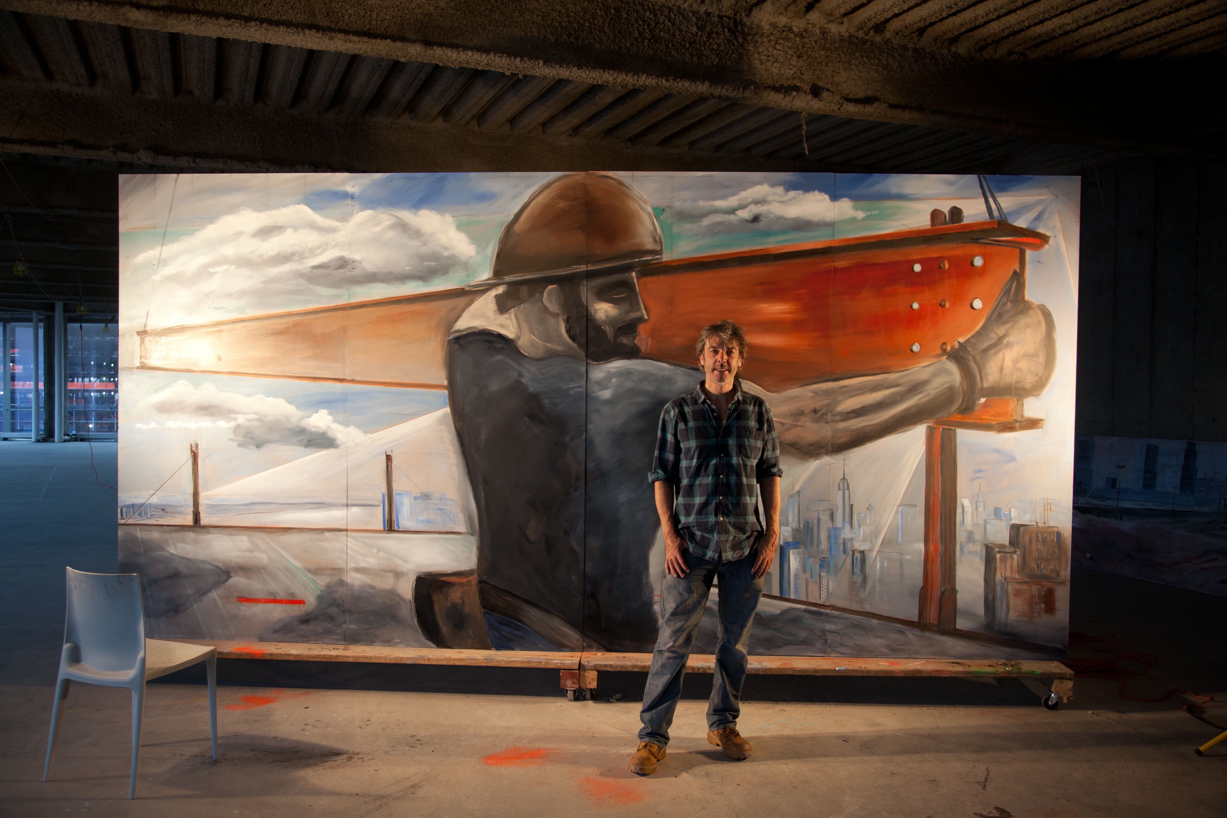 Marcus Robinson with an example of his work inspired by the rebuilding at the World Trade Center site. 	Allan Tannenbaum