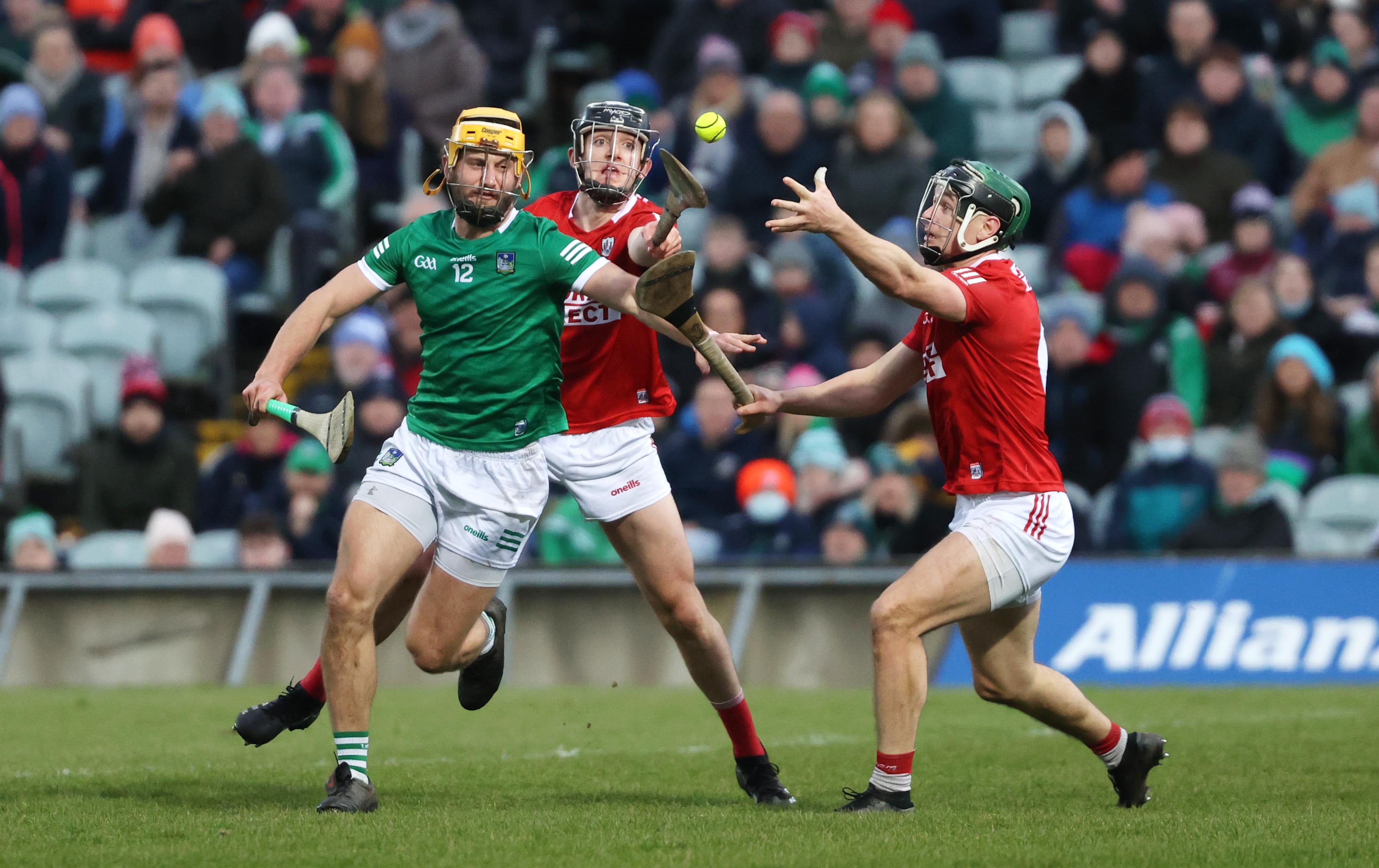 Limerick's Tom Morrissey in action against Ger Millerick and Mark Coleman of Cork INPHO/BRYAN KEANE