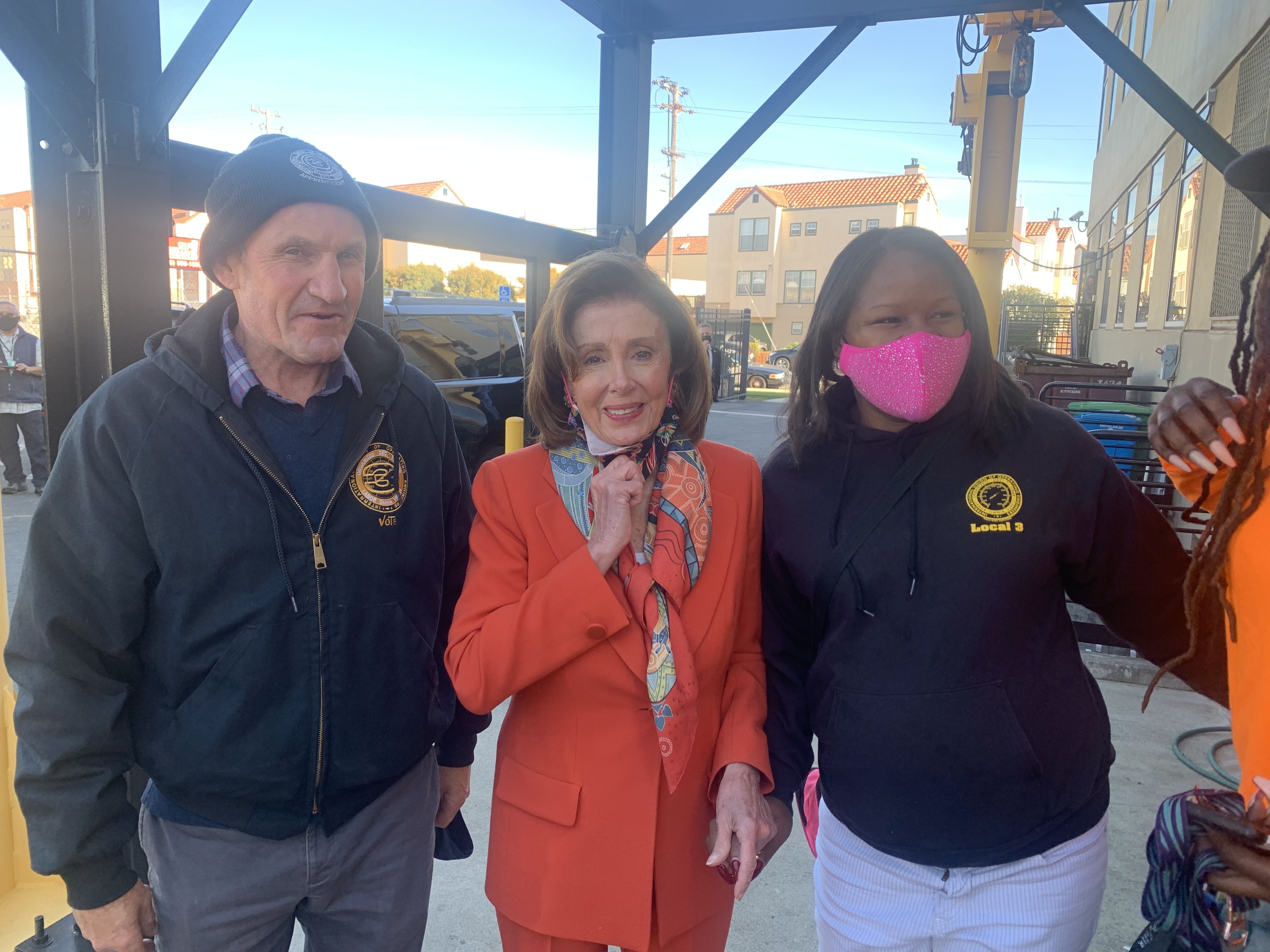 SPEAKING UP: Charlie joins with union colleague Meg-Anne Pryor to welcome Nancy Pelosi to a San Francisco construction site to learn more about the IUOE apprenticeship programs.