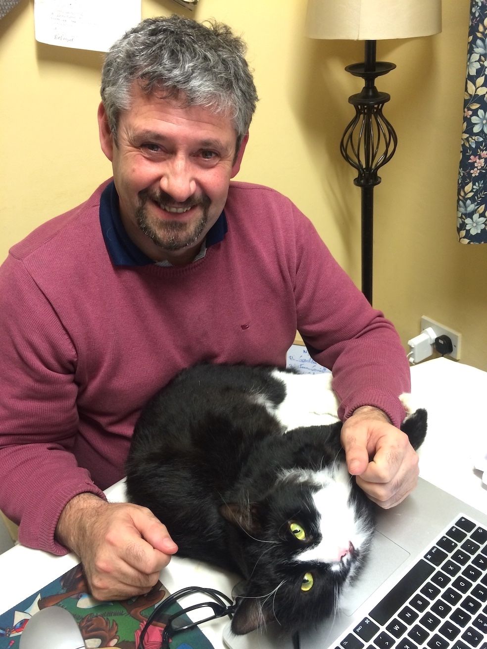 Monaghan-based Joseph McCabe pictured during a writing break with his cat, Sylvester.