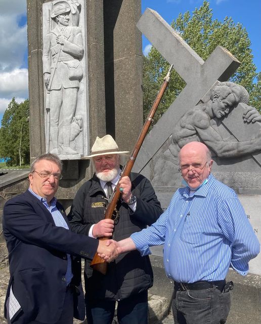 The Mauser Rifle is handed over to its new owner, Conor Downes.