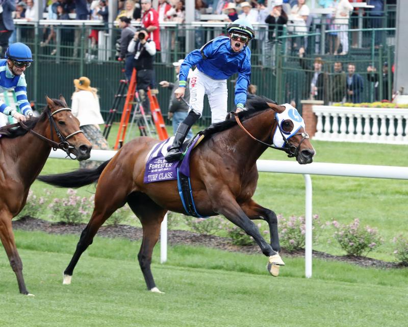 Jockey Tyler Gaffalione exults aboard Santin after winning the Old Forester Bourbon Turf Classic at Churchill Downs. COADY PHOTOGRAPHY