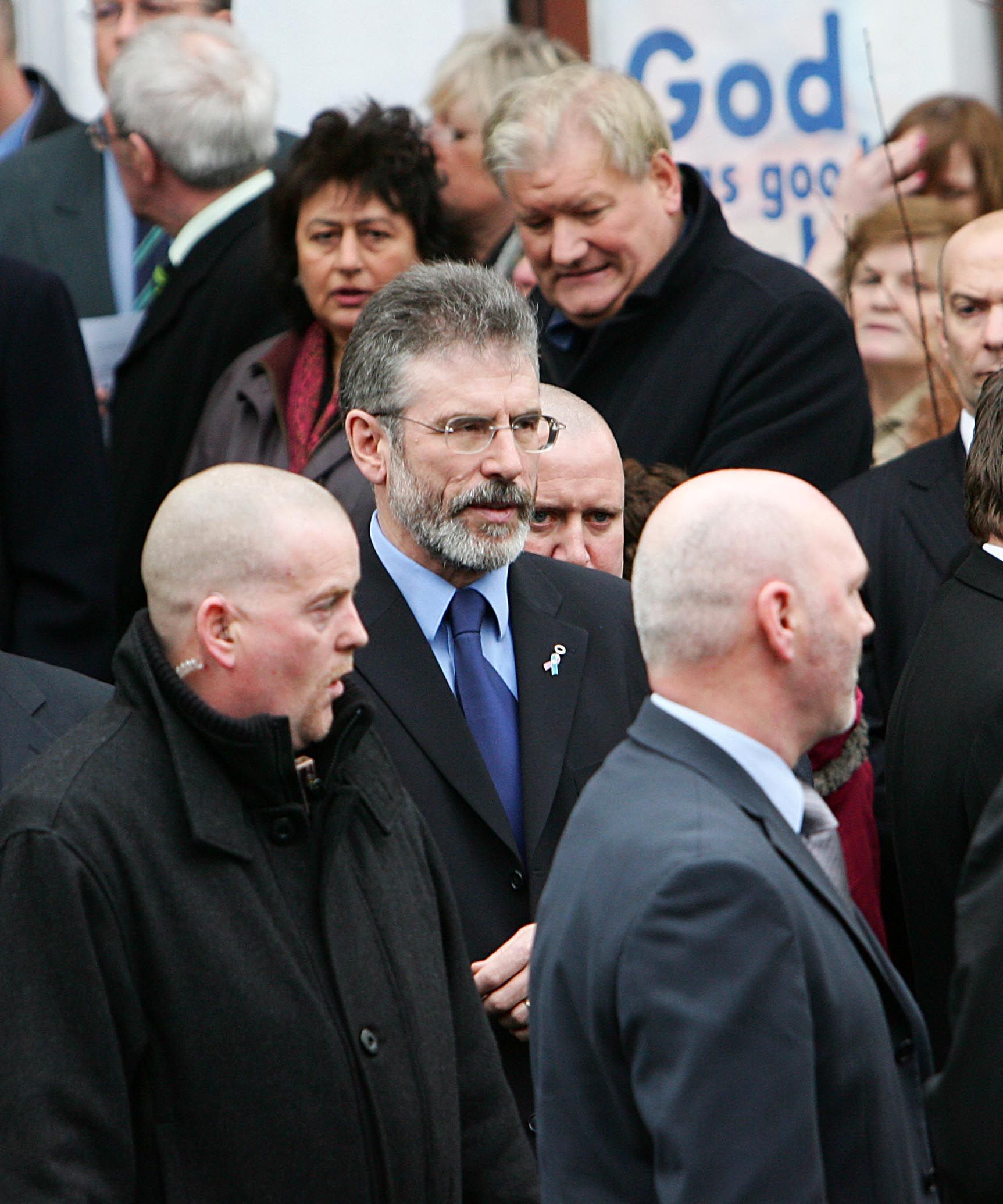Attending David Ervine's funeral.