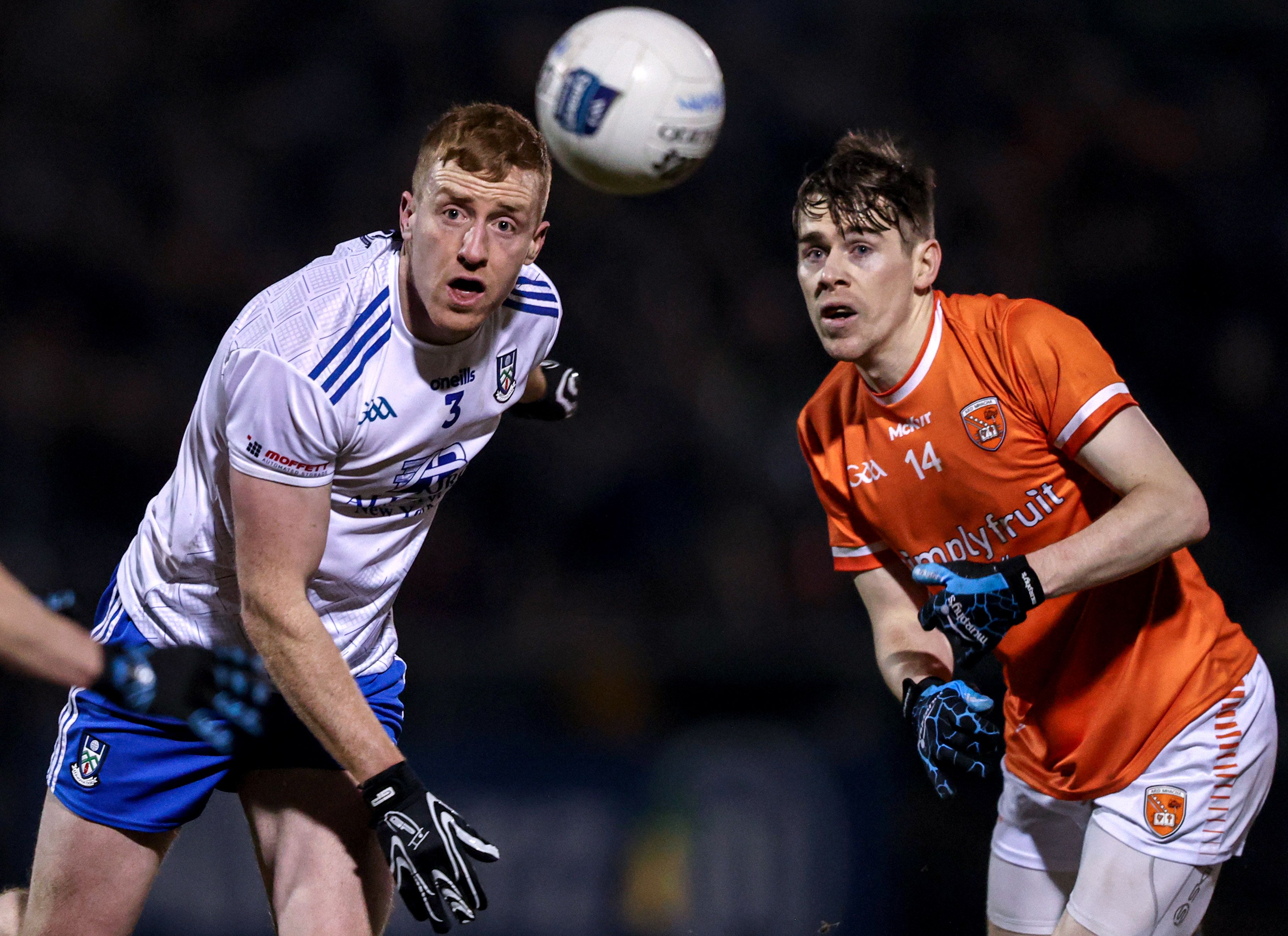 Monaghan’s Kieran Duffy and Andrew Murnin of Armagh in action in Castleblaney.  INPHO/TOM MAHER