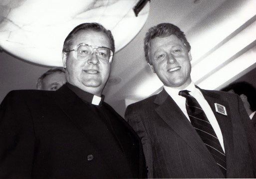 Fr. Sean McManus with future president Bill Clinton.