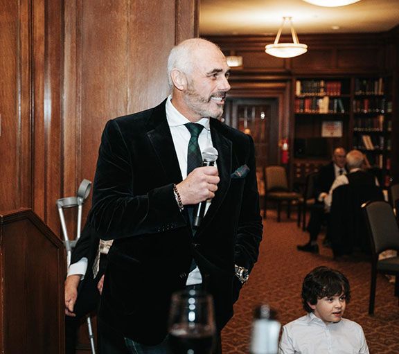 Billy Jr. making a toast