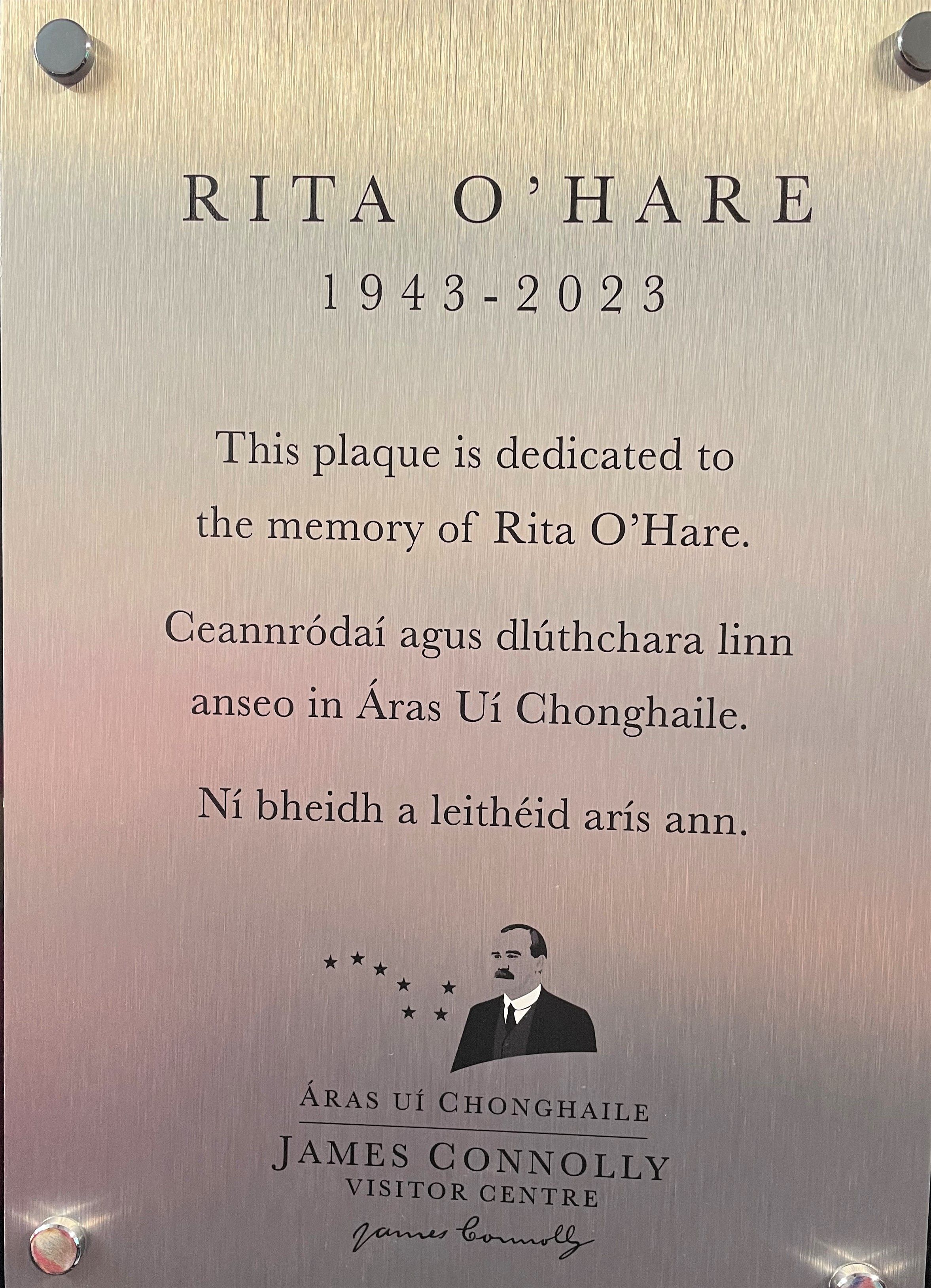 Unveiling the plaque dedicated to Rita O'Hare.