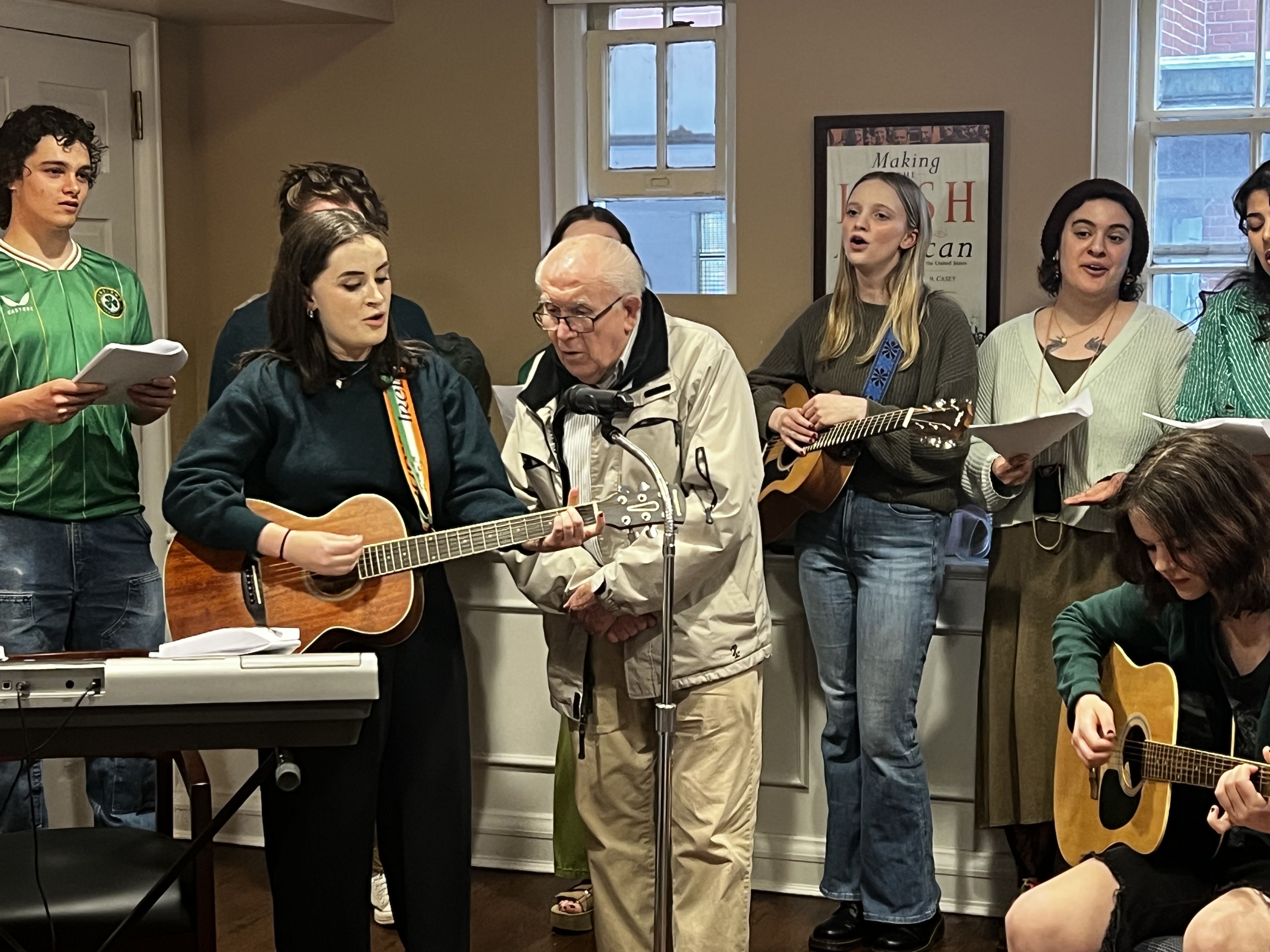 Michael O'Neill, originally from Kilkenny, singing alongside his granddaughter on guitar, 'Oró Sé do Bheatha 'Bhaile'