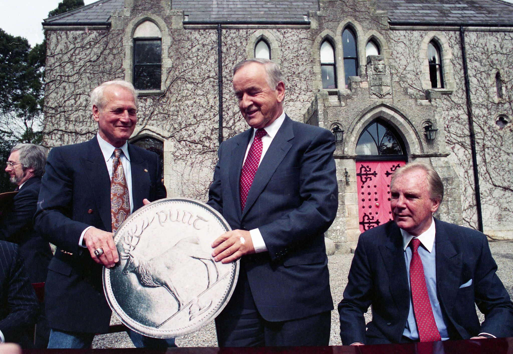 Three giants in their fields: Actor Paul Newman, then Taoiseach Albert Reynolds and Independent News and Media Chairman Tony O'Reilly at Barretstown Castle in Kildare, April 30, 1994. Newman had signed a 99 year lease with the Irish government at a pound per year. It would be a home for sick children.  RolligNews.ie photo.