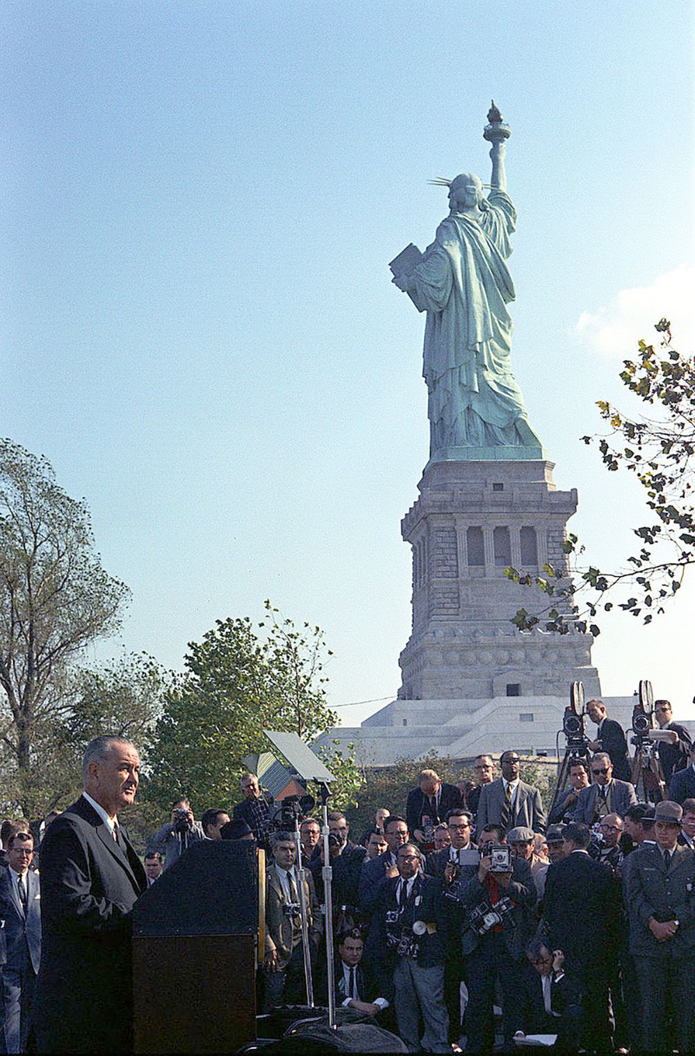 President Johnson delivering his speech on Liberty Island.