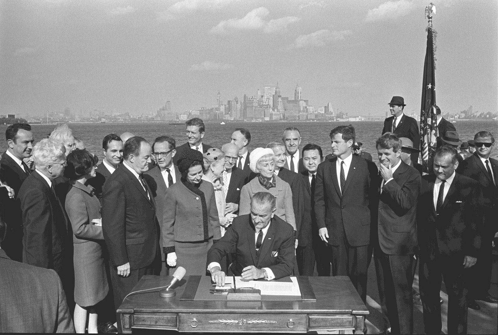 President Lyndon Johnson signing the 1965 Immigration and Nationality Act into law.