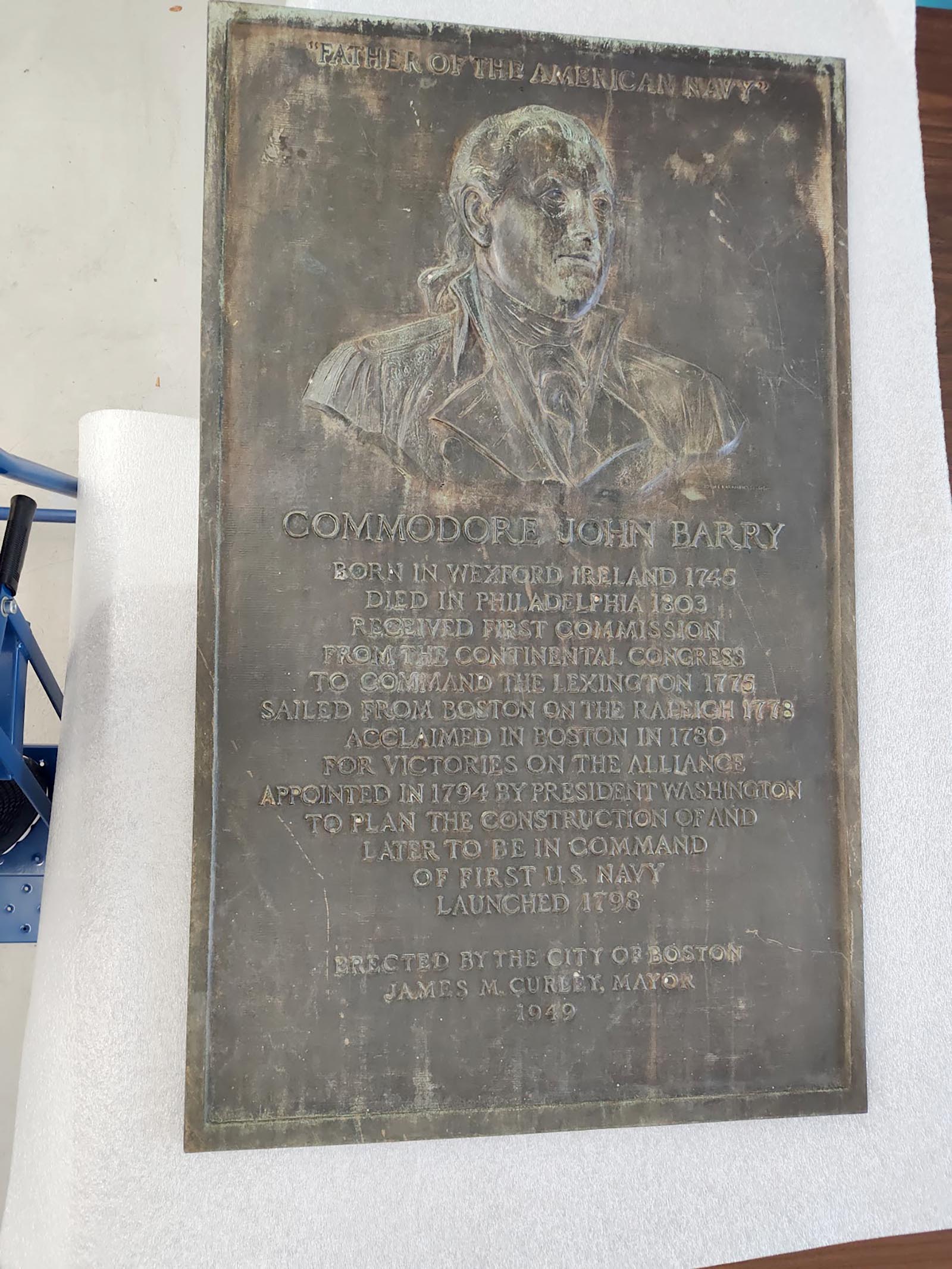The Barry bronzed plaque in storage at the Navy Yard.