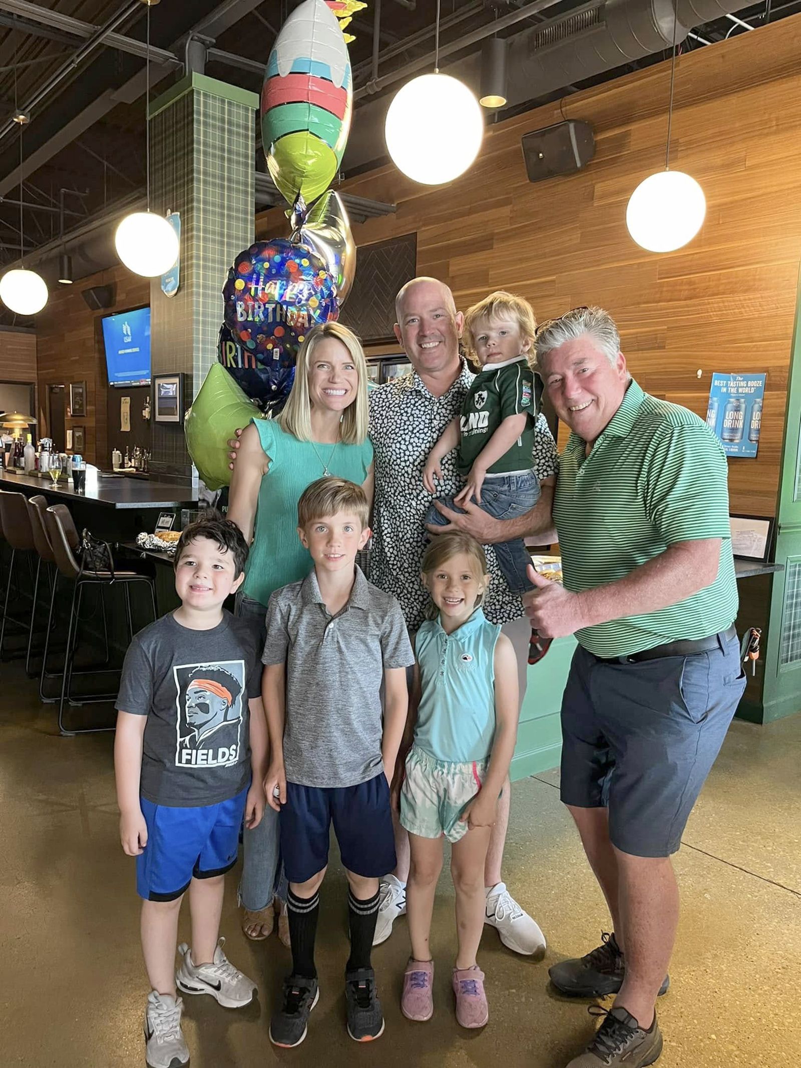 Kevin with son Mike, and wife Lauren and grand kids