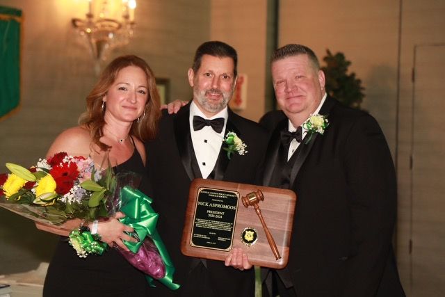 SUFFOLK SALUTE: Kathleen &  Nicholas Aspromgos with John Bruckard