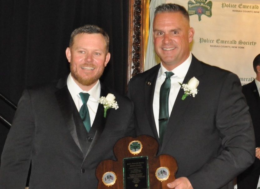 SALUTE: President Casey Quinn with honoree Robert Phaneuf