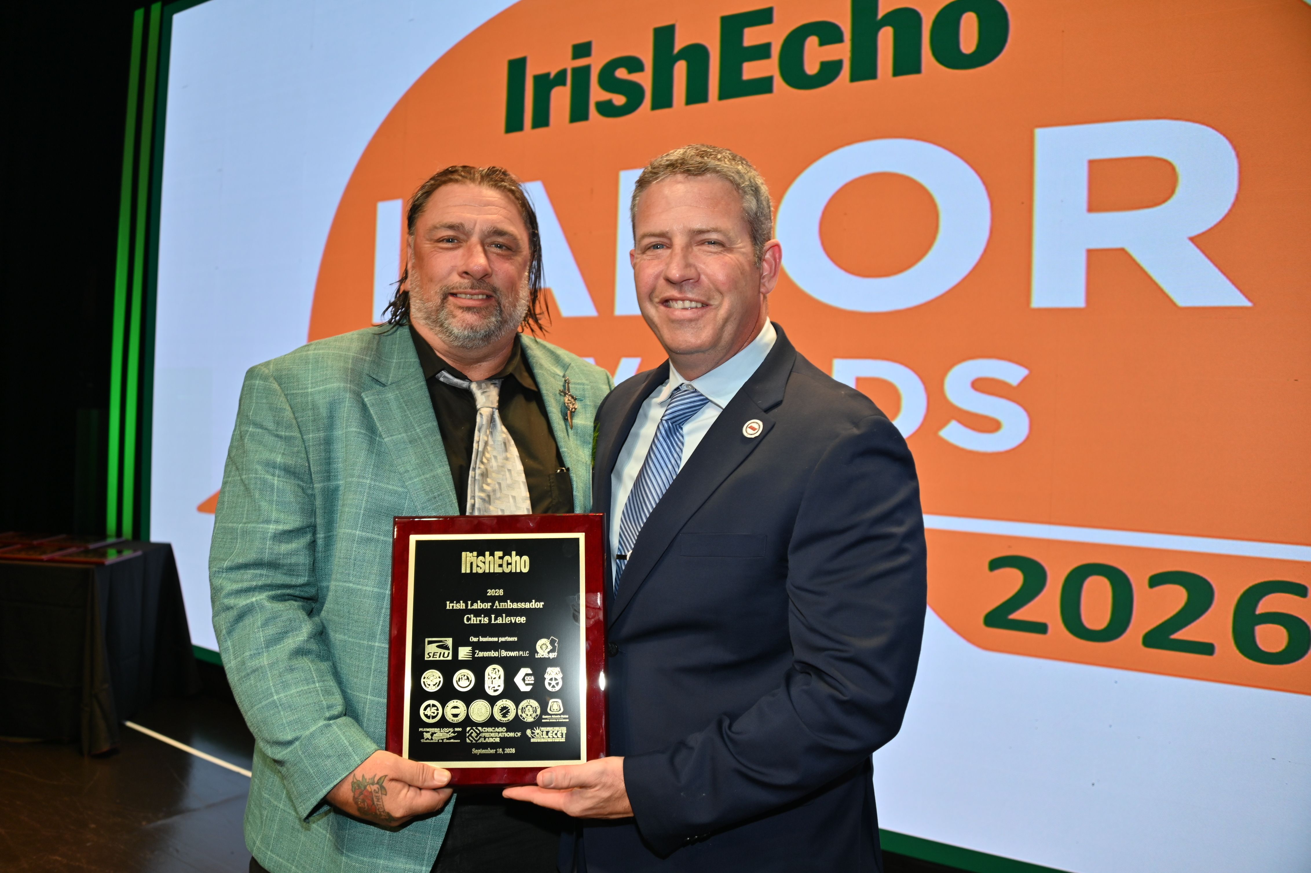SERVICE: Chris Lalevee receives his Irish Labor Ambassador plaque from Tim Crane of the IUOE