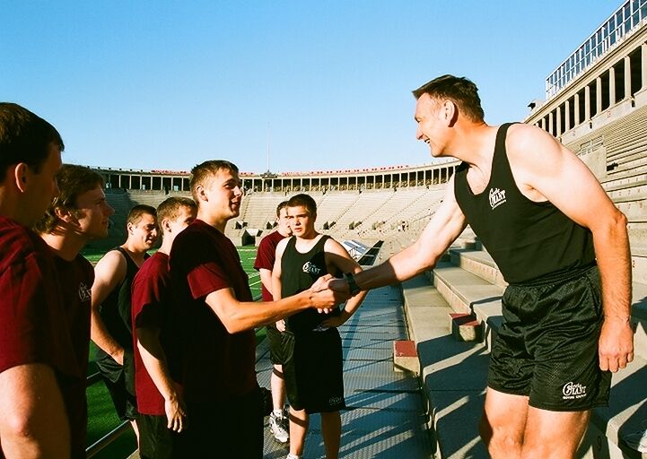 ON THE UP: Larry O'Toole in Harvard Stadium with new-hires